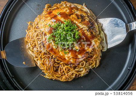 お好み焼き Okonomiyaki is a Japanese-style pancake お好み焼き Okonomiyaki is a Japanese-style pancake 53814056