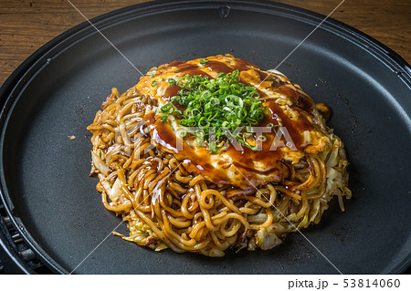 お好み焼き Okonomiyaki is a Japanese-style pancake お好み焼き Okonomiyaki is a Japanese-style pancake 53814060