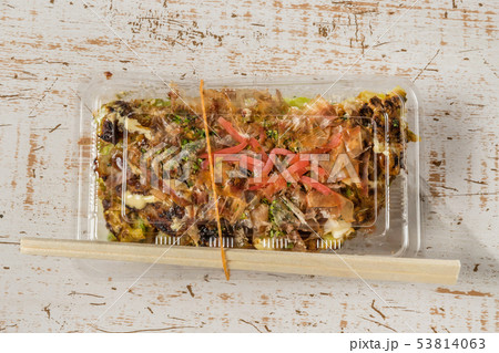 お好み焼き  Okonomiyaki is a Japanese-style pancake 53814063