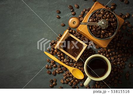 Coffee cup and coffee equipment on cement floor. Coffee cup and coffee equipment on cement floor. 53815516