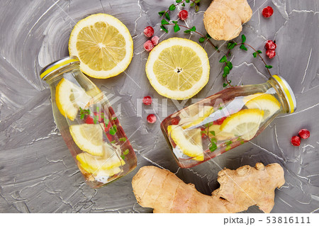 Detox water in bottles with cranberrie, ginger, 53816111