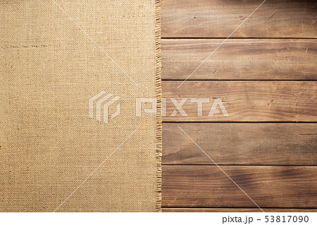 burlap hessian sacking on wooden background table burlap hessian sacking on wooden background table 53817090