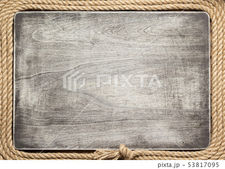 ship rope at wooden board background ship rope at wooden board background 53817095
