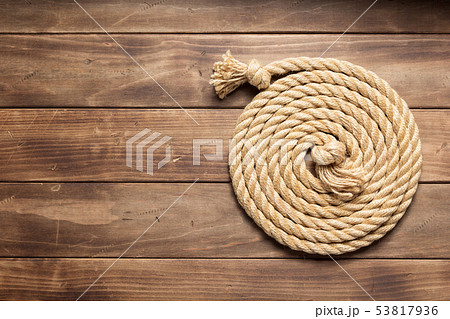 ship rope at wooden background texture ship rope at wooden background texture 53817936