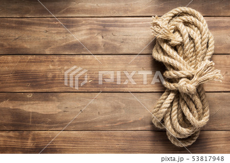 ship rope at wooden background texture ship rope at wooden background texture 53817948