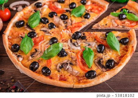 Tasty fresh hot pizza  53818102