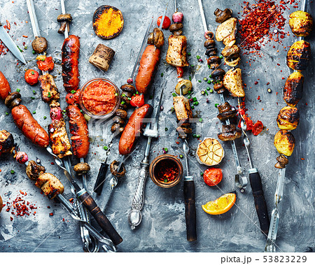 Grilled vegetables, meat and sausage 53823229