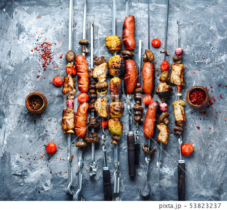 Grilled vegetables, meat and sausage 53823237