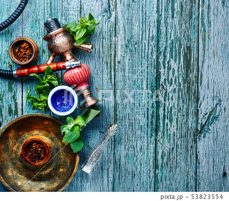 Smoking hookah with mint 53823554