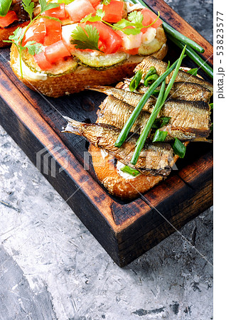 Traditional italian bruschetta 53823577