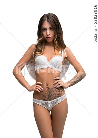 Slim girl in white lingerie isolated view 53823916