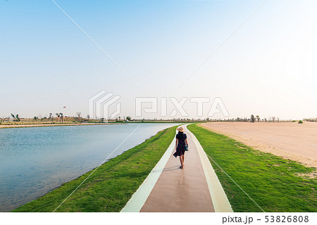 Tourist walking around Love lakes in Dubai 53826808