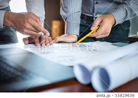 Construction engineering or architect discussing a 53829636