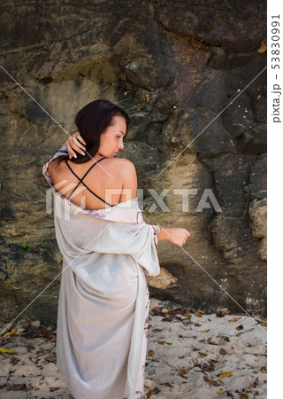 Young girl in an image geisha transparent dressing Young girl in an image geisha transparent dressing 53830991