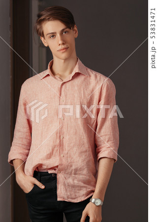 Portrait of masculine attractive european young man with brown eyes, dreaming face expression Portrait of masculine attractive european young man with brown eyes, dreaming face expression 53831471