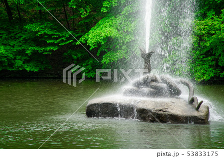 Fountain in form of snake with open mouth Fountain in form of snake with open mouth 53833175