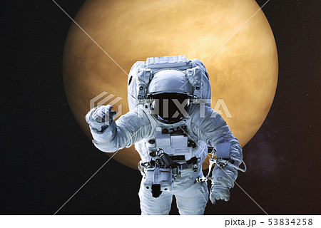Astronaut on the background of Venus 53834258