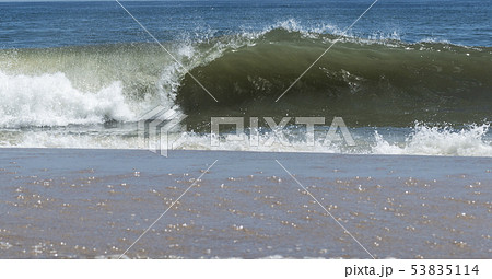 Atlantic ocean wave breaking on the shore Atlantic ocean wave breaking on the shore 53835114