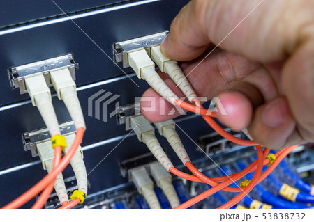 Hand of man holding The Fiber Optic Cable Hand of man holding The Fiber Optic Cable 53838732