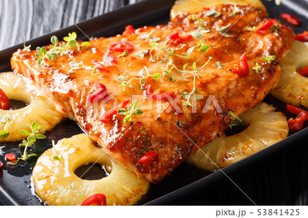 Salmon with pineapple and herbs in chili sweet 53841425