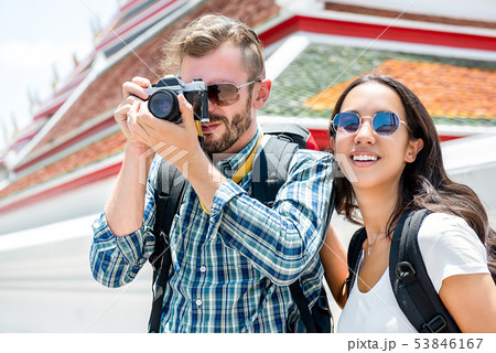 Backpackers taking photos in Bangkok Backpackers taking photos in Bangkok 53846167
