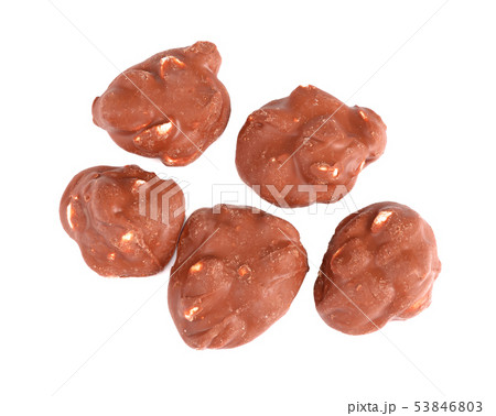 Chocolate Pieces Nuts Isolated On white Chocolate Pieces Nuts Isolated On white 53846803