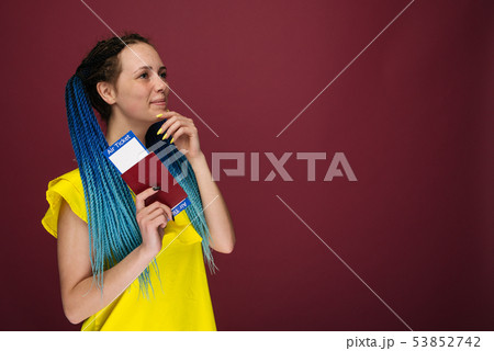 A modern trendy smiling woman in yellow dress with A modern trendy smiling woman in yellow dress with 53852742