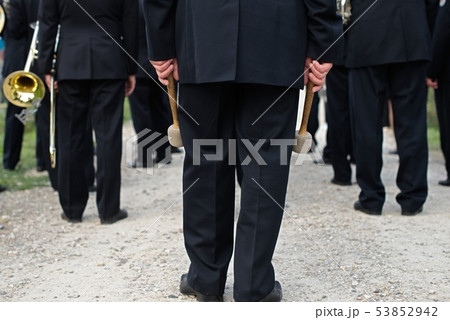A closeup of the hands of a drummer at a parade. A closeup of the hands of a drummer at a parade. 53852942