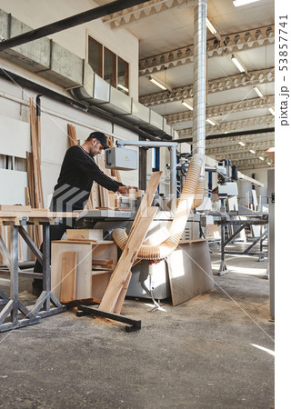 A Company Of Quality. Craftsman work at his workstation 53857741