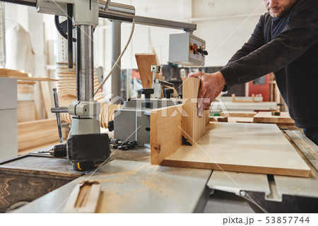 Artisans in Manufacturing. Cropped shot of craftsman working at his workstation 53857744