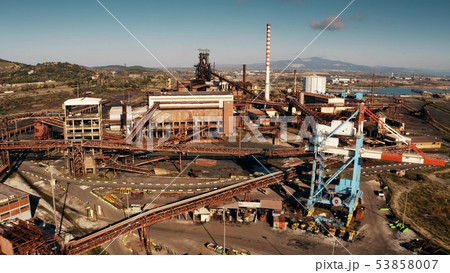 Aerial shot of old industrial facility near Piombino, Italy Aerial shot of old industrial facility near Piombino, Italy 53858007