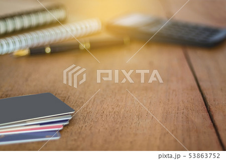 Credit card or debit card on working table 53863752