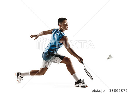 Little boy playing badminton isolated on white studio background Little boy playing badminton isolated on white studio background 53865372