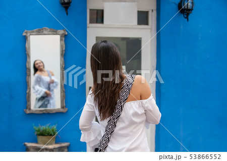 Woman walking at the walled city in Cartagena Woman walking at the walled city in Cartagena 53866552