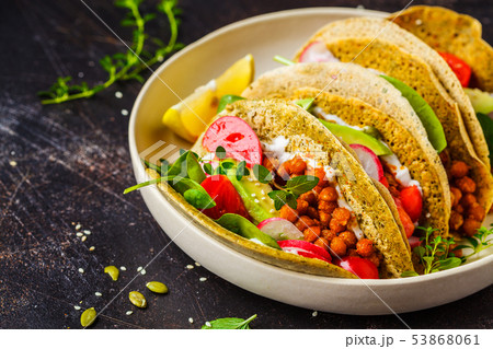 Vegan tacos with baked chickpeas, avocado Vegan tacos with baked chickpeas, avocado 53868061
