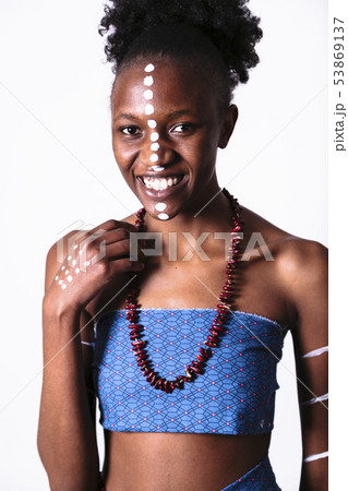 African girl with pattern on her face laughing African girl with pattern on her face laughing 53869137