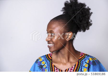 Portrait of smiling african girl in blue dress Portrait of smiling african girl in blue dress 53869186