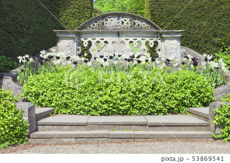 Ornamental grey stone staircase and balustrade 53869541