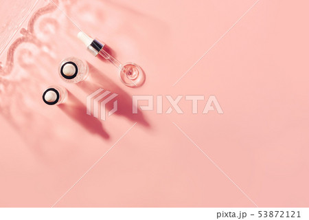 Hyaluronic acid, botulin, serum in vials. Concept of cosmetic surgery for facial rejuvenation. 53872121
