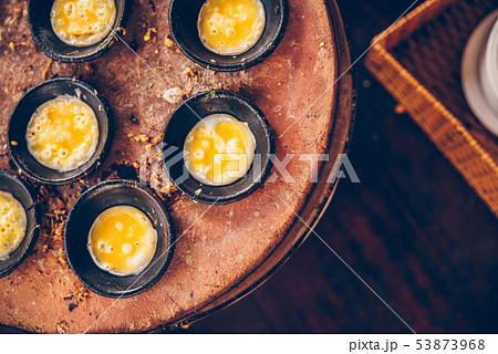 Vietnamese mini fried eggs, cooking on the street - Traditional Vietnamese food Vietnamese mini fried eggs, cooking on the street - Traditional Vietnamese food 53873968