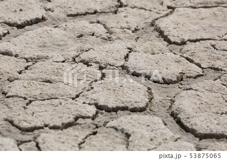 Cracked black ground 53875065