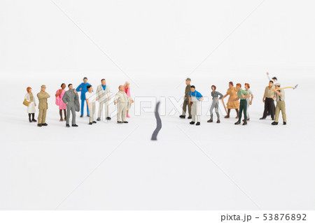 some miniature businessmen fighting against worker 53876892