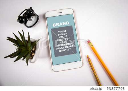 Brand concept. Smartphone on white table Brand concept. Smartphone on white table 53877793