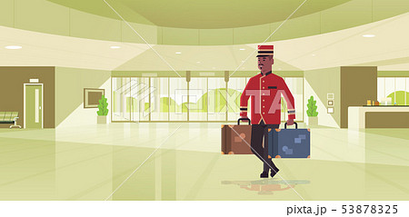 bell boy carrying suitcases hotel service concept african american bellman holding luggage male 53878325