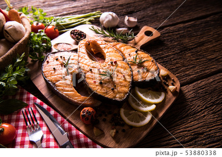 Grilled salmon fish with seasoning  53880338