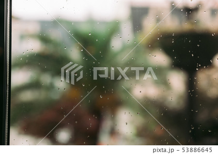 raindrops on window glass in the summer. raindrops on window glass in the summer. 53886645
