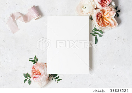 Feminine wedding, birthday stationery mock-up scene. Blank paper greeting card with bouquet of green 53888522