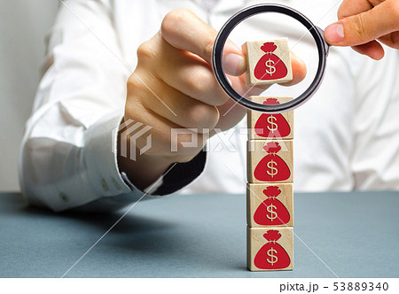 Businessman removes a cube  53889340