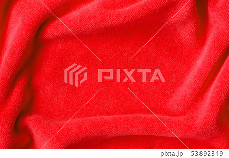 Red draped velvet textile 53892349