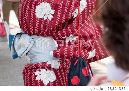 Young girl wearing Japanese kimono standing in Young girl wearing Japanese kimono standing in 53894385